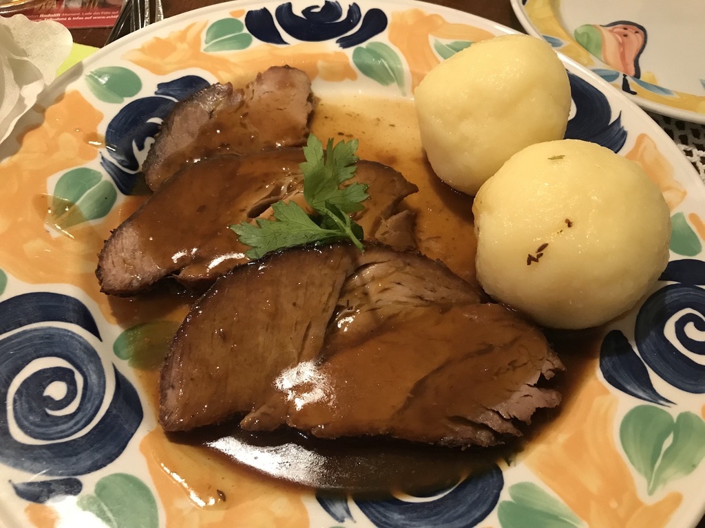 Classic German food. Beef with Kartoffelklöße
